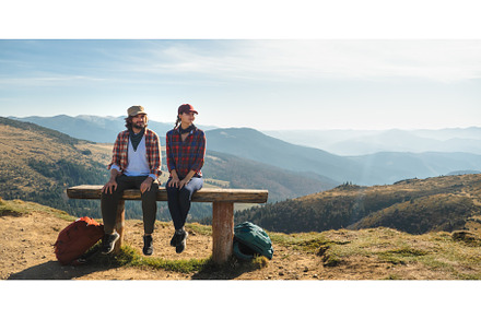 Couple of Hikers With Backpacks in