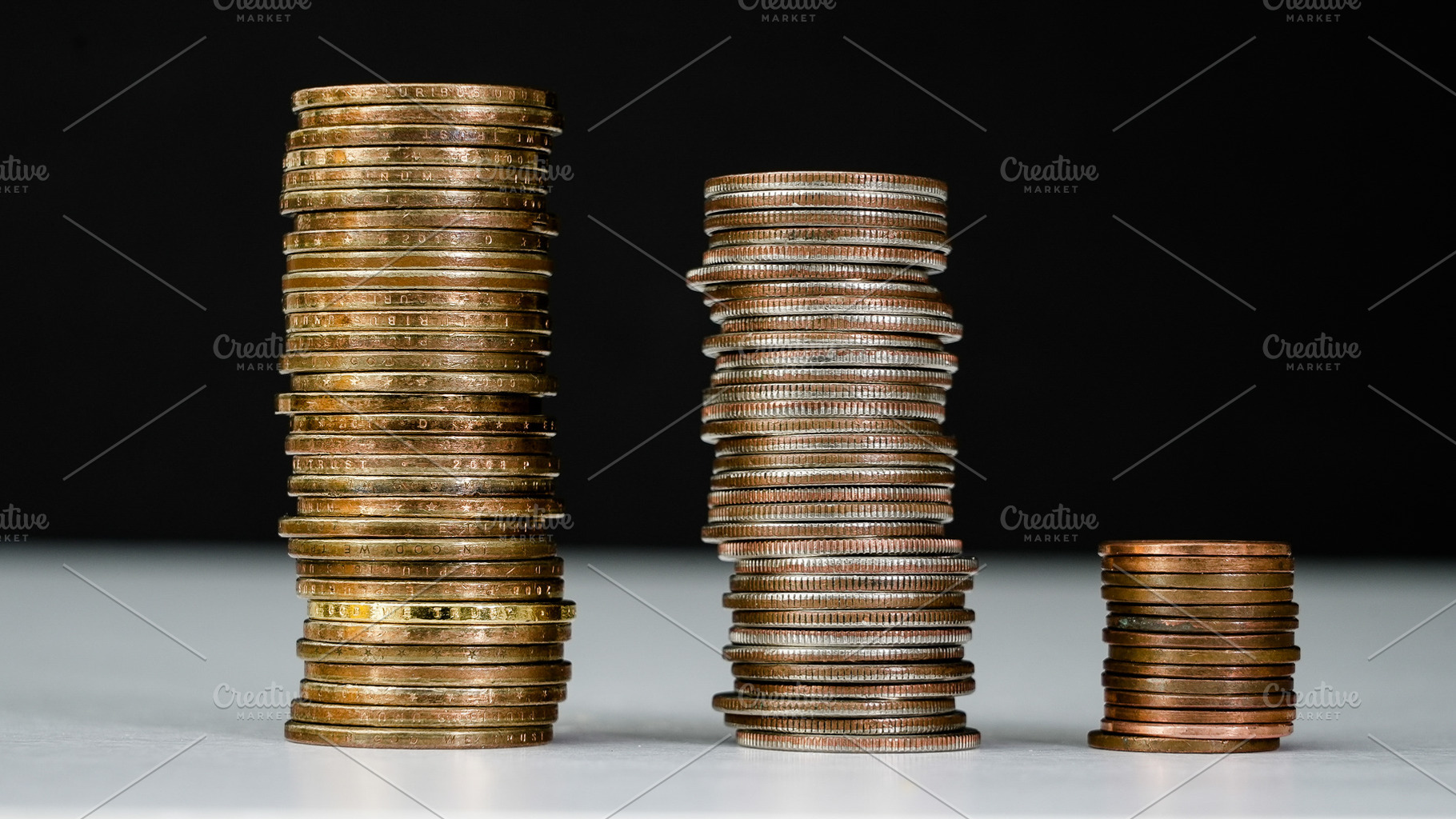 Stacks of coins arranged by size sho, a Business Photo by 1miromiro