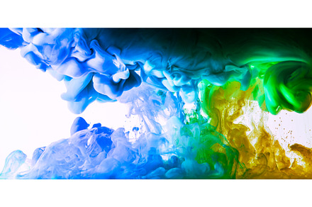 Flowing blue, green and yellow ink, an Abstract Photo by MadPhotos