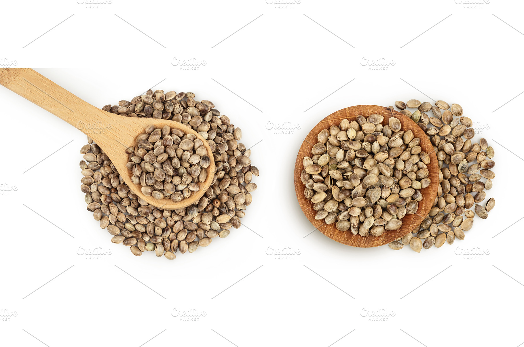 Hemp seeds in wooden spoon isolated, a Food & Drink Photo by NataPhoto