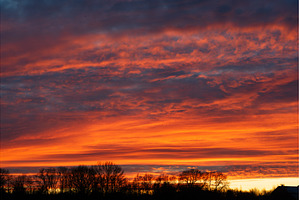Fiery sunset sky with dramatic, a Nature Photo by Oleksandr Masnyi