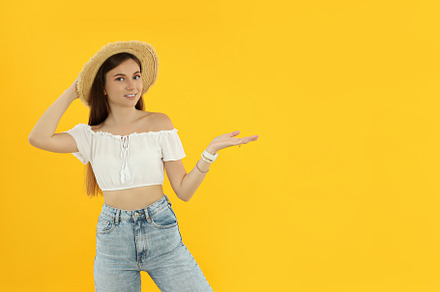 Concept of people, young woman on yellow background, a Person Photo by AtlasStudio PRO