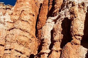 Utah red rock formations under blue sky in a dramatic desert canyon landscape, a Nature Photo by AS photostudio