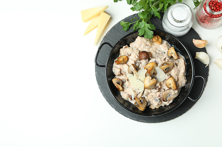 Concept of tasty food with risotto with mushrooms, space for tex, a Background Photo by AtlasStudio PRO