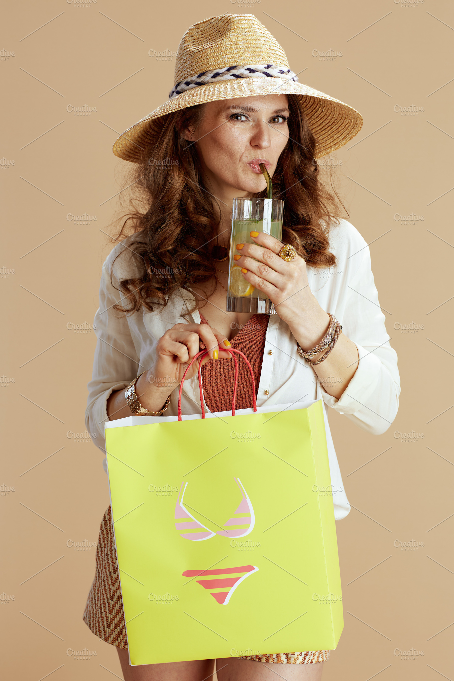 smiling elegant woman in blouse and shorts, a Person Photo by Alliance Images