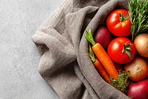 Fresh vegetables in linen cloth, a Food & Drink Photo by AlyaAnd