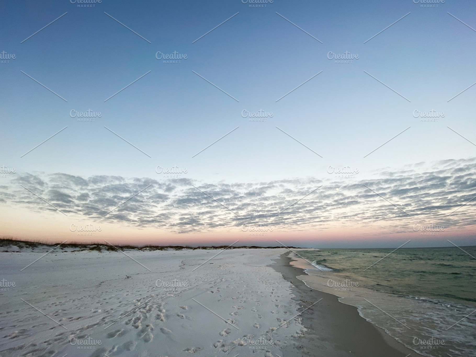 Serene Florida Pensacola beach at sunrise with white sand, calm ocean, and past, a Nature Photo by AS photostudio