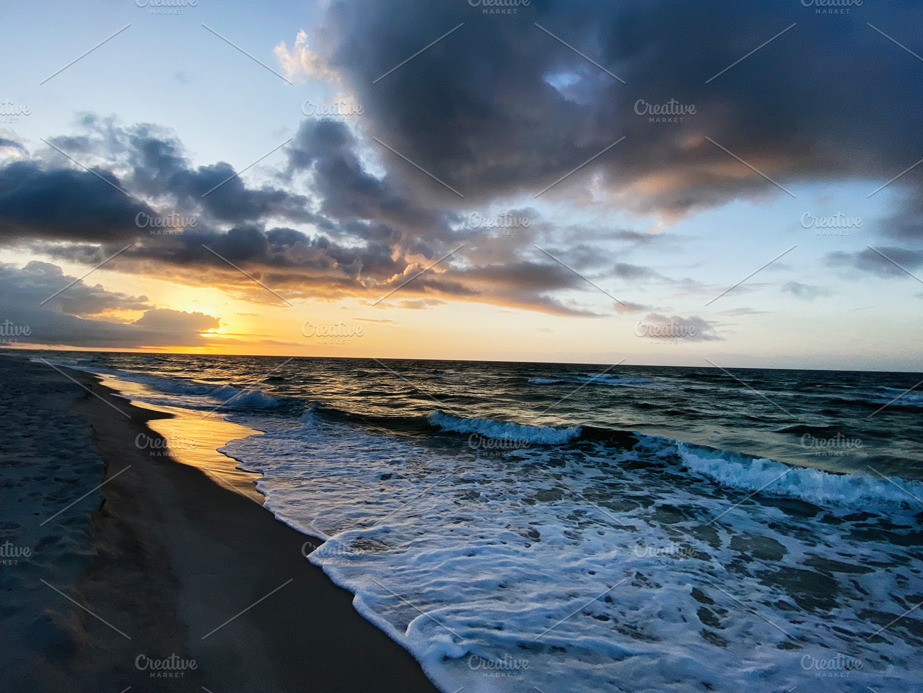Sunset on a Florida Pensacola beach with waves rolling to shore and dramatic cl, a Nature Photo by AS photostudio