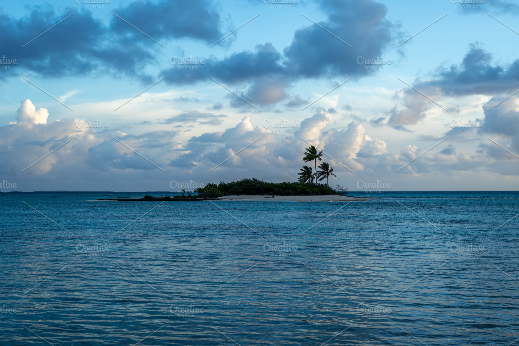 Sunset over a tropical motu on Tikehau Atoll, French Polynesia, a Nature Photo by GoodGoods