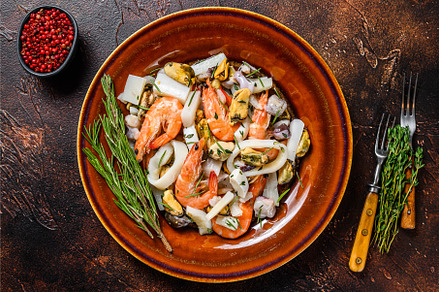 Raw mix seafood cocktail with