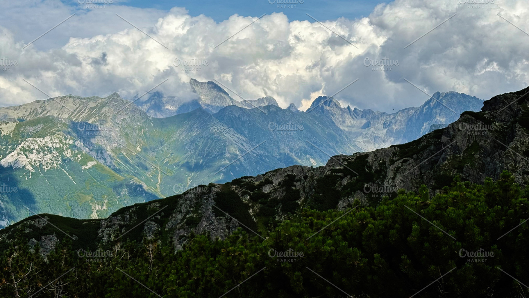 Majestic mountain panorama from Zakopane Poland with rugged peaks and green for, a Nature Photo by AS photostudio