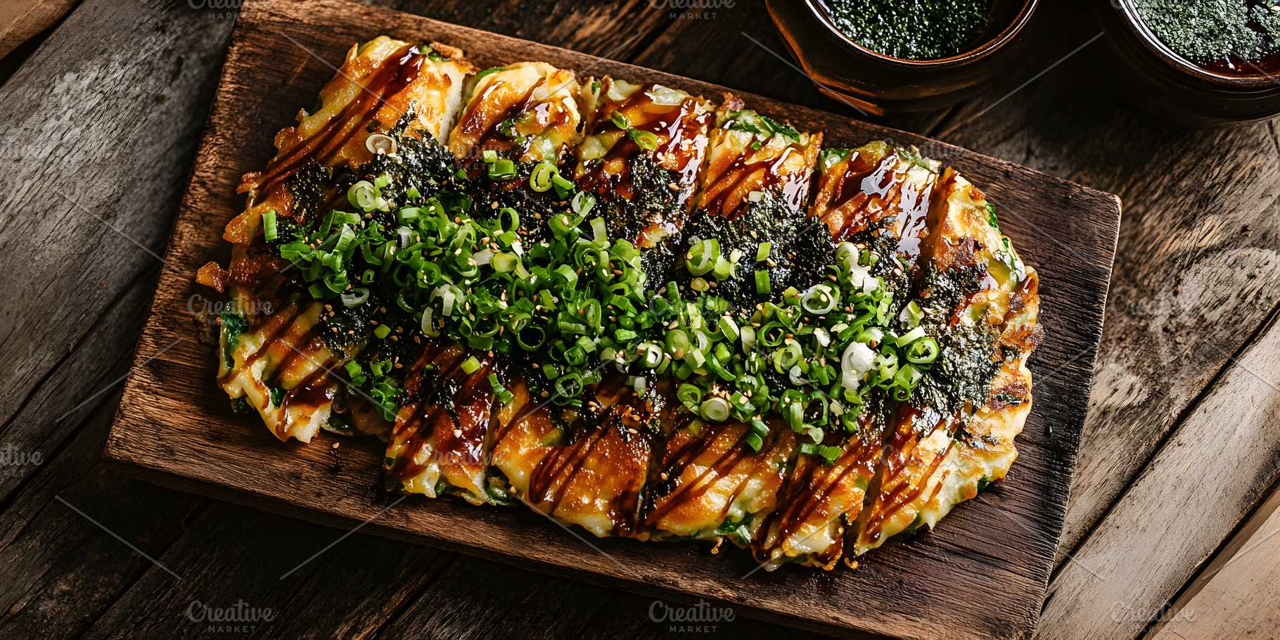 Okonomiyaki Japanese savory pancake with toppings, a Food & Drink Photo by Photostock