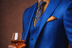 a man holding a glass in a blue suit, generative AI, a Photo by Nito