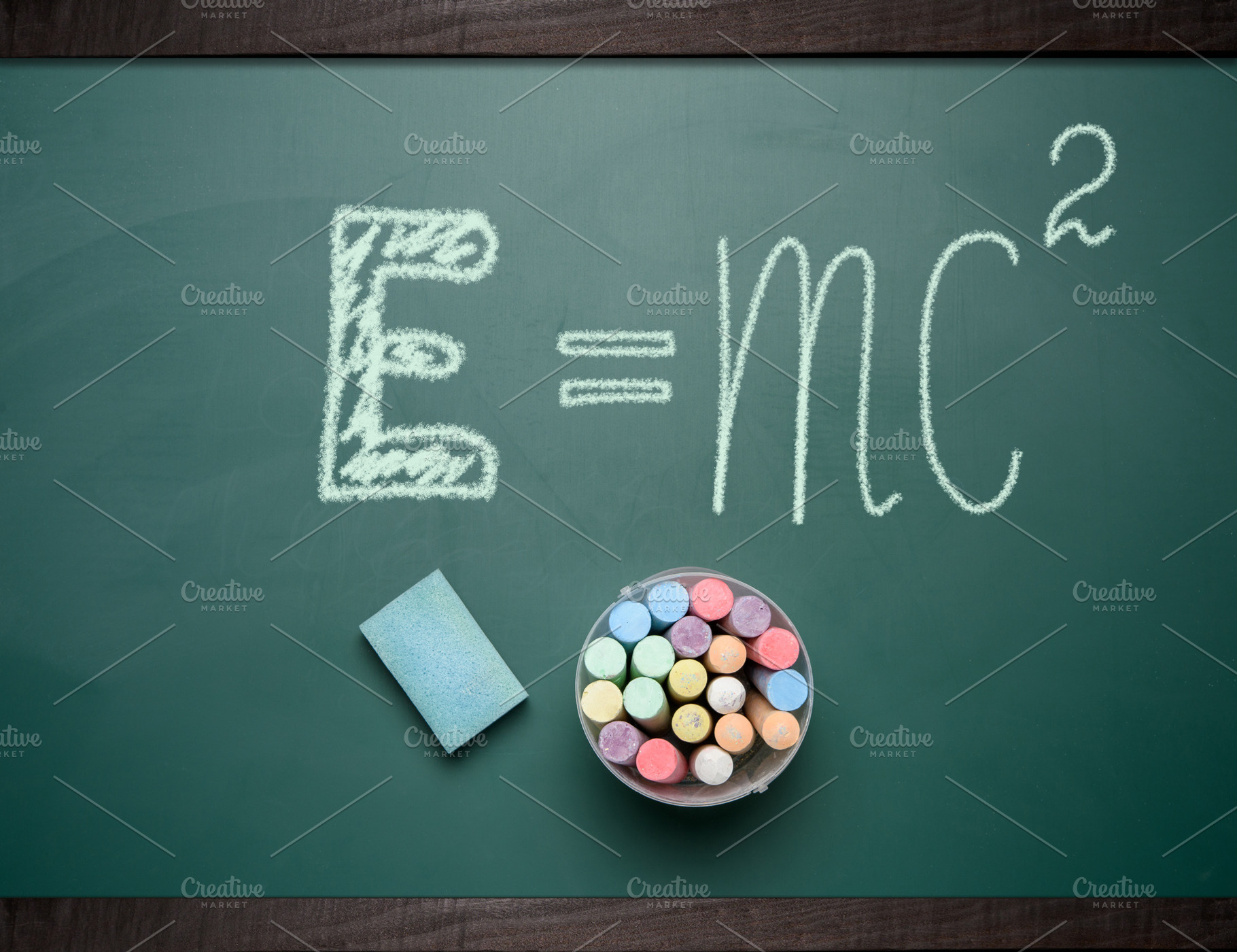A school board with an equation written in chalk expressing the, a School & Education Photo by ndanko
