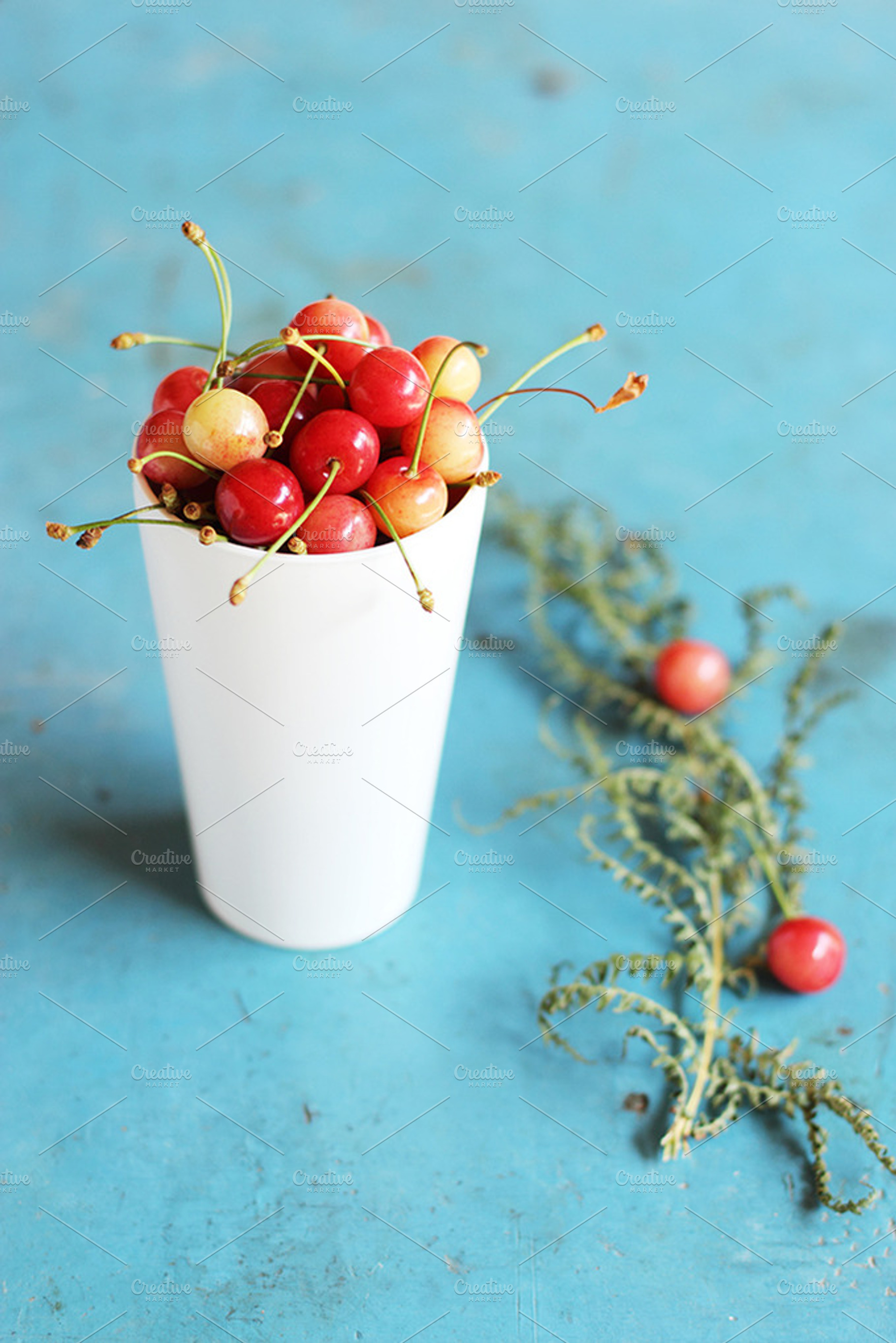 Fresh cherries stock photo containing fresh cherries and white plastic glass