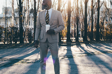 Elegant Man, Cream Suit and Shadows, a Person Photo by SkyNext