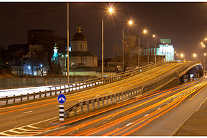 The bridge of a traffic interchange at night containing night, road, and, a Transportation Photo by Leonid Andronov
