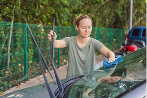 Woman cleaning her car, organizing, a Person Photo by Elizaveta Galitskaya