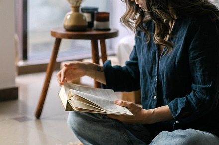 Banner. Woman reading a book, a Person Photo by Anikona