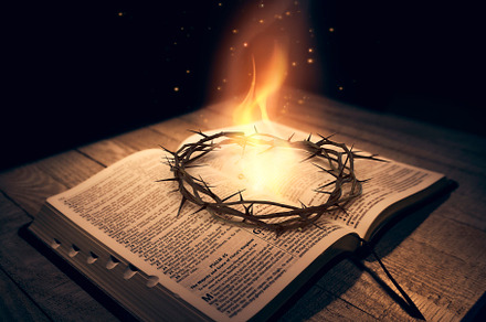 Crown of Thorns on Bible with fire, a Photo by Javier Art Photography