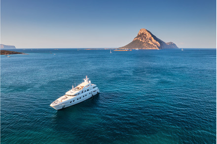 Aerial view of luxury yacht on blue, a Nature Photo by den-belitsky
