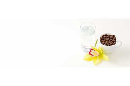 Cup of coffee beans and glass of, a Food & Drink Photo by okskukuruza