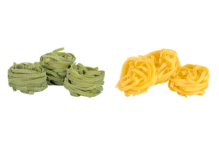 Raw tagliatelle green pasta with, a Food & Drink Photo by NataPhoto