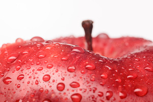 Wet red delicious apple featuring agriculture, apple, and bright