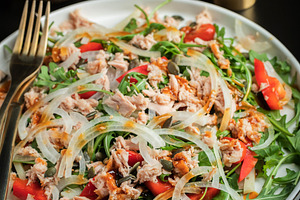 Fresh Tuna Salad with Onions and Cherry Tomatoes. Italian Mediterranean Cuisine, a Food & Drink Photo by Budarinphoto