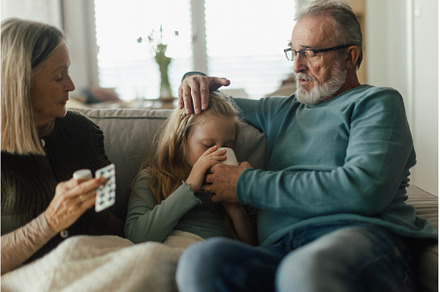 Grandparents taking care of their, a Person Photo by HalfPoint