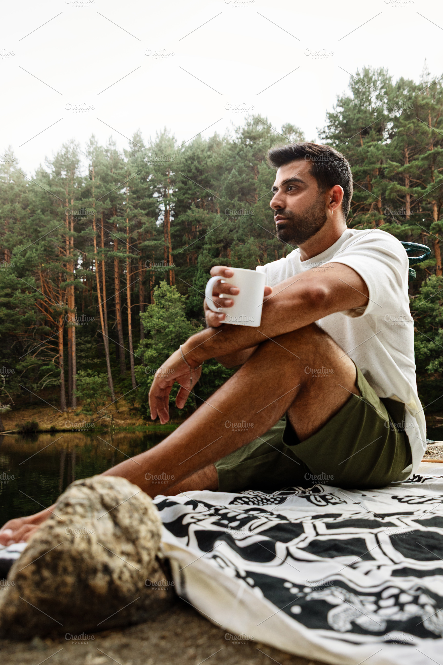 Man drinking coffee in nature, a Person Photo by Perpis
