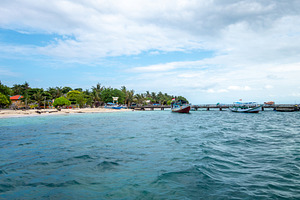 Fishing boats and beach of Pulau Liukang Loe, Sulawesi, Indonesi, a Nature Photo by GoodGoods