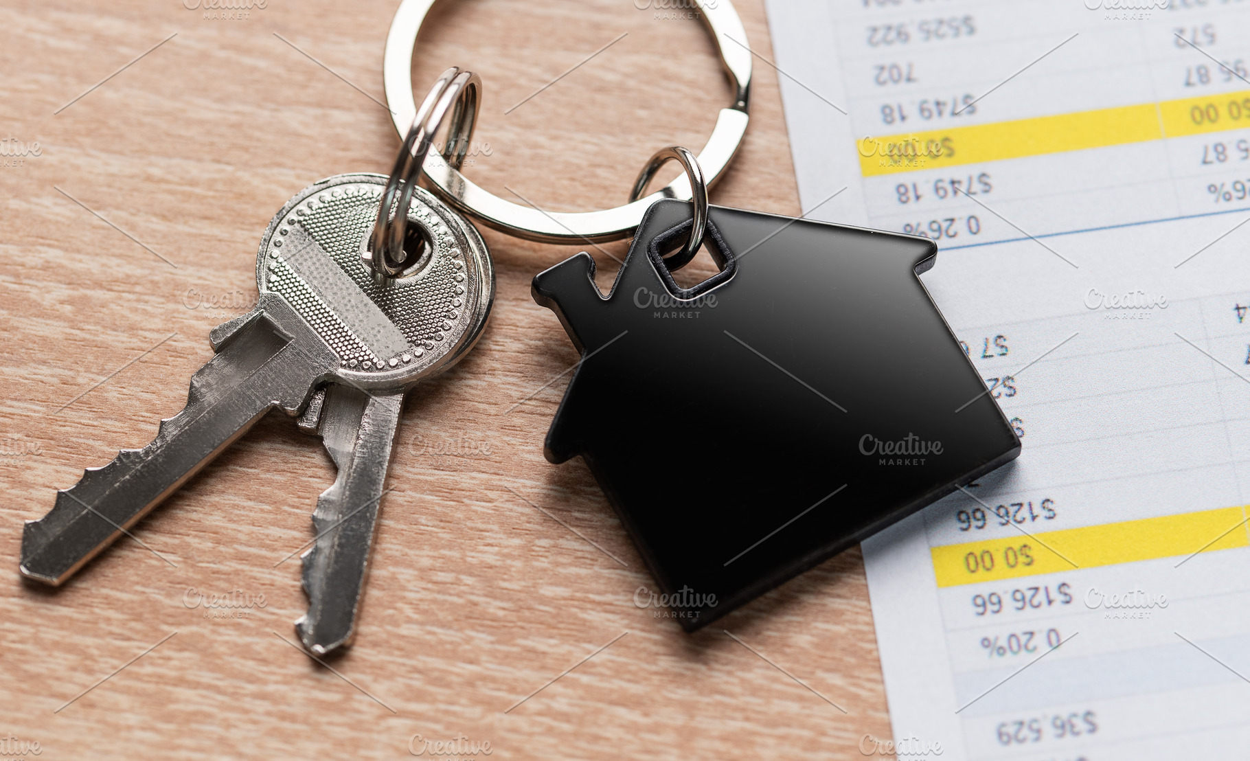 House keys and financial sheet for real estate investment, a Business Photo by Olena Rudo