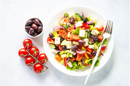 Greek salad with olives at white., a Food & Drink Photo by Nadia-nb