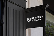 Logo Mockup White Sign Building, a Product Mockup by Asylab (Thumbnail 3 of 5)