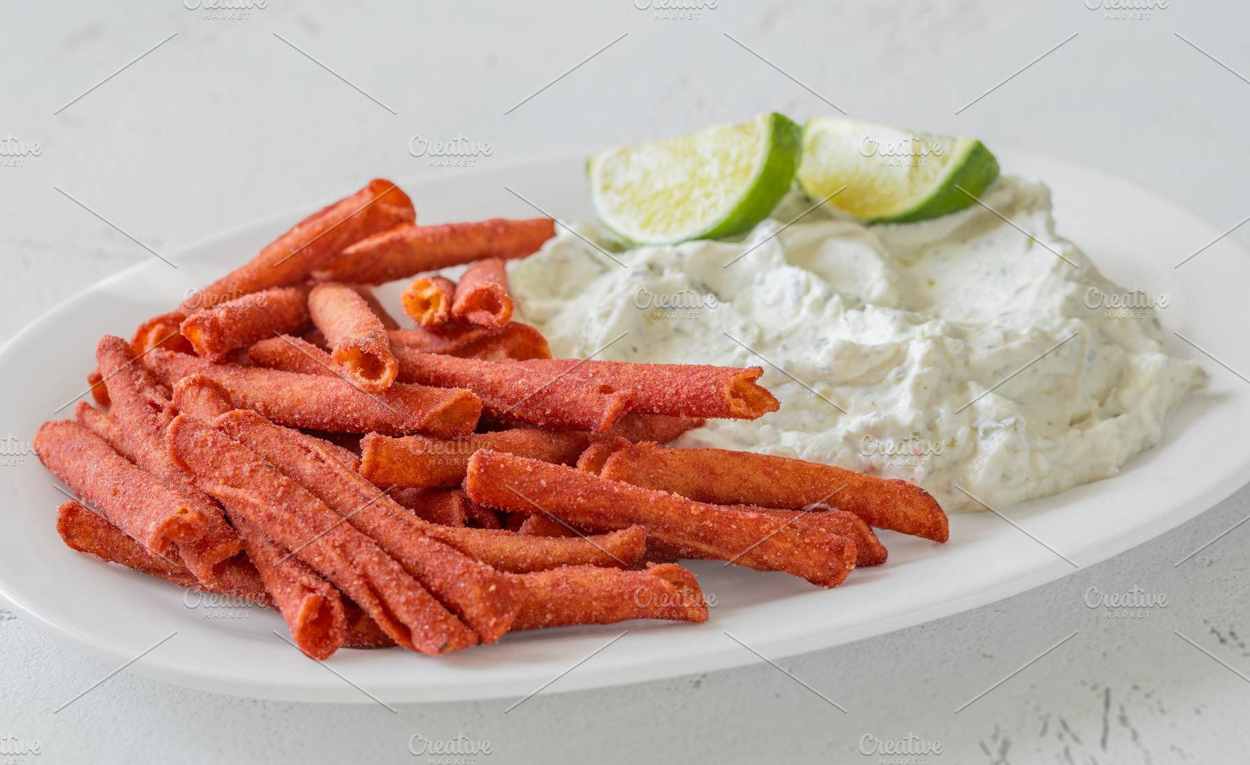 Spicy Takis Fuego Served With Garlic Herb Cream Cheese Dip, a Food & Drink Photo by Alexander Prokopenko