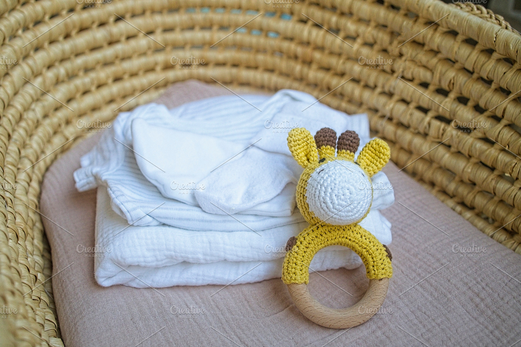 basket there are things for the baby and wooden and knitted toys, a Beauty & Fashion Photo by TanaCh