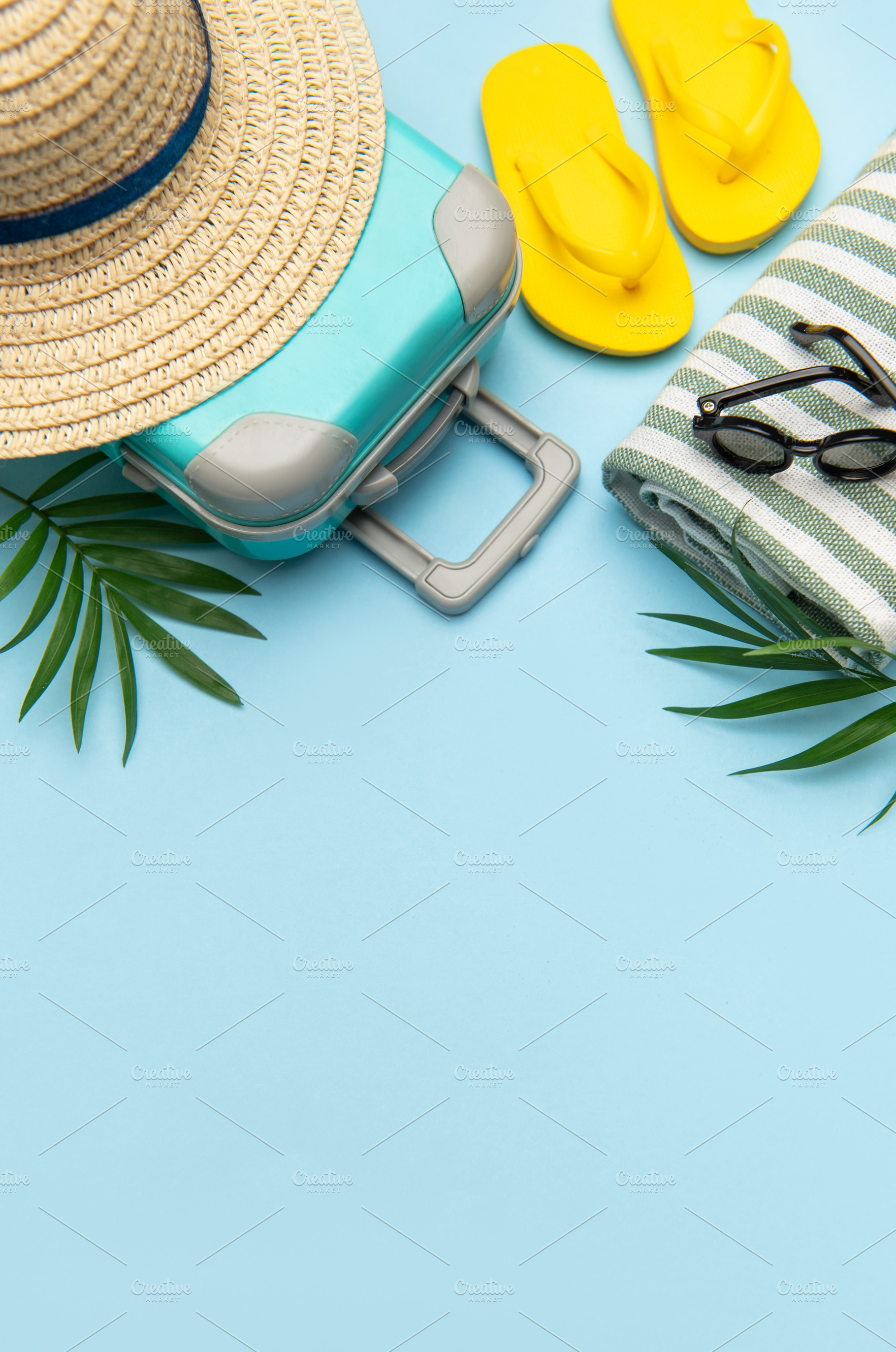 Suitcase, beach towel, flip flops, sunglasses and a straw hat su, a Holiday Photo by Olena Rudo