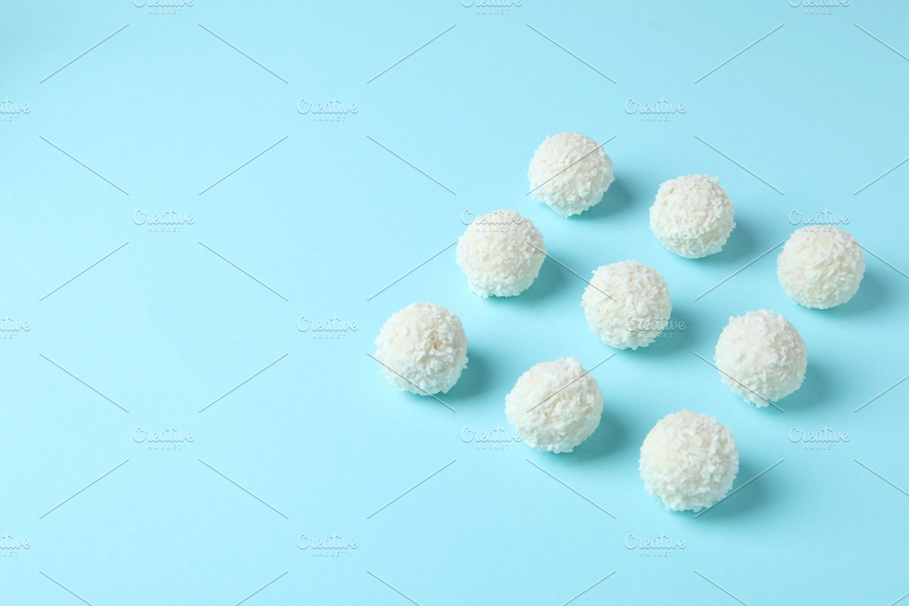 Concept of tasty sweets, coconut candies, space for text, a Food & Drink Photo by AtlasStudio PRO