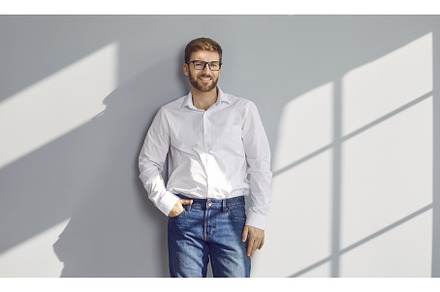 Portrait of man in white shirt, blue, a Person Photo by StudioRomantic