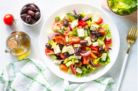 Greek salad with olives at white., a Food & Drink Photo by Nadia-nb