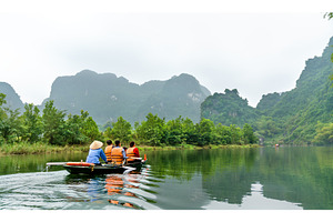 Touristic rowboat at the trang an containing vietnam, travel, and boat, a Nature Photo by Leonid Andronov