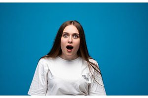 Young woman having surprised, a Person Photo by volodymyrshtun13795