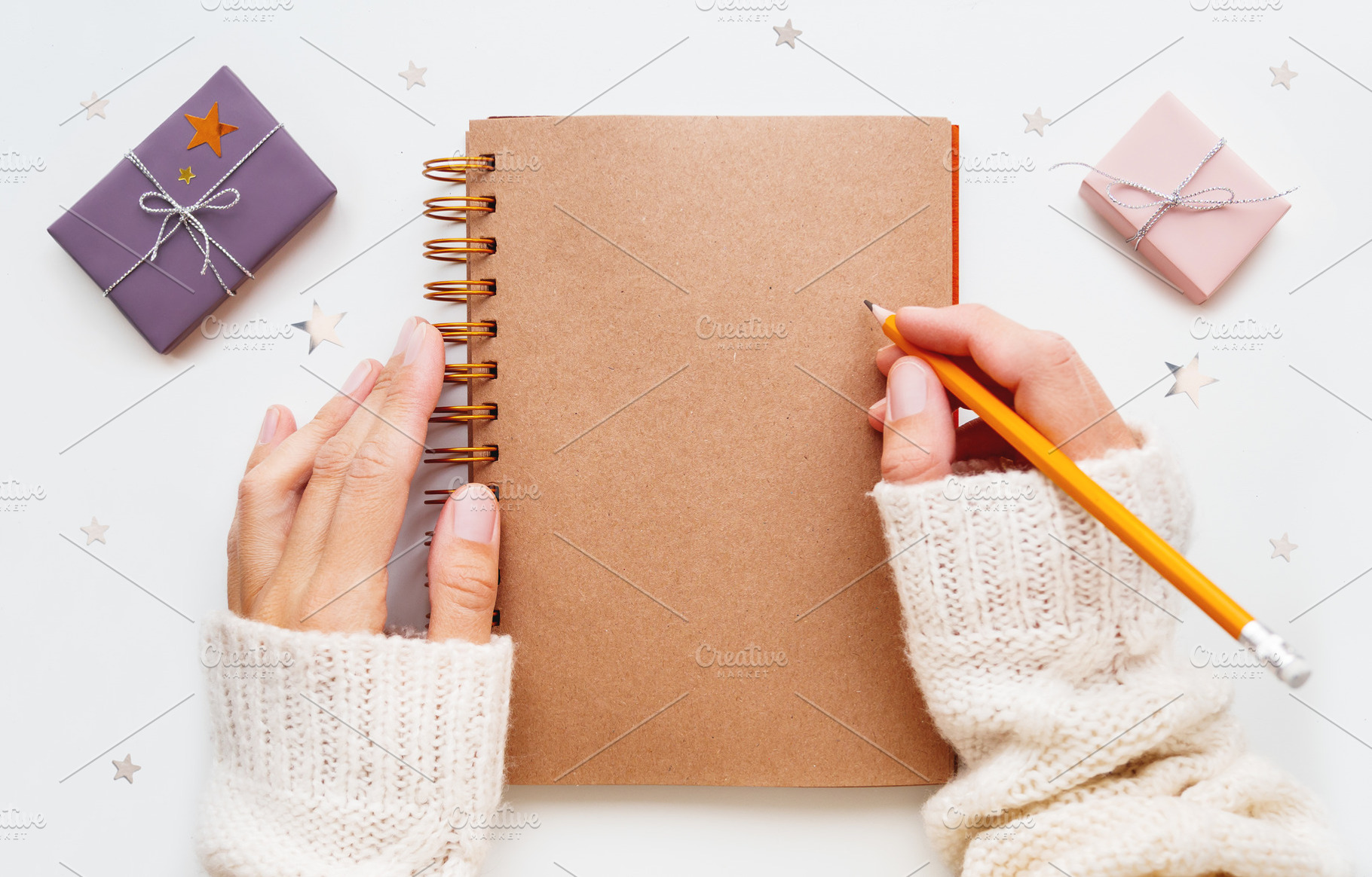 Woman is preparing to write or draw containing christmas, new year, and goal, a Holiday Photo by Aksenov_K