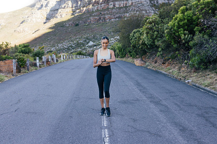Full length of a smiling female walk, a Sports & Recreation Photo by Artem Varnitsin