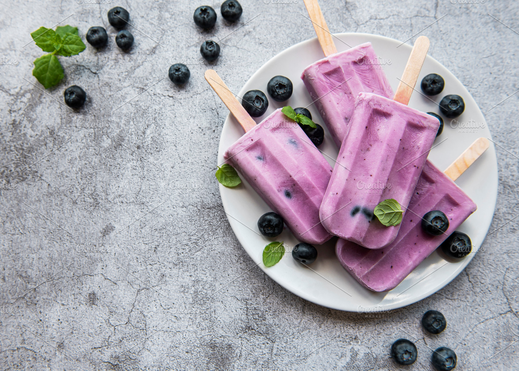 Ice cream popsicles from fresh organic blueberries., a Food & Drink Photo by Olena Rudo