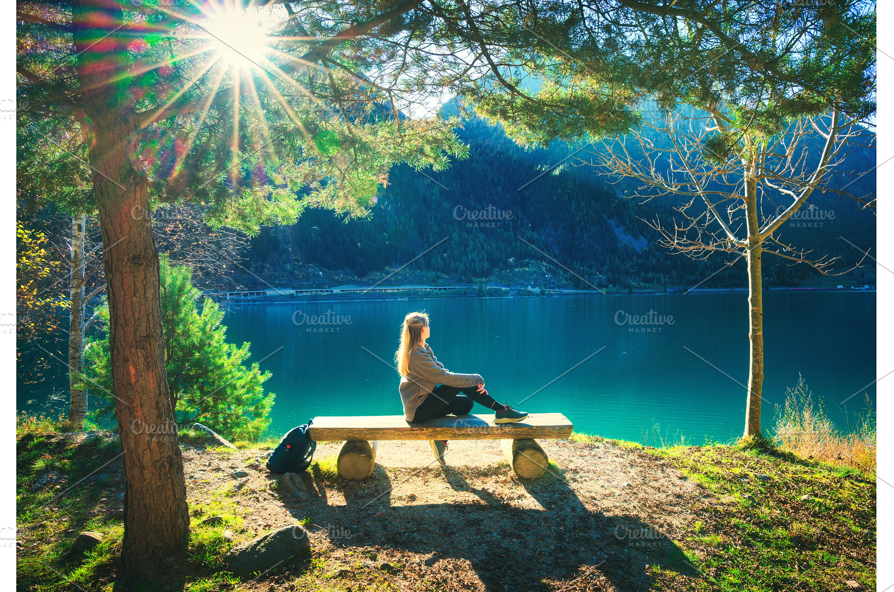 Young woman sitting on the bench, a Person Photo by den-belitsky