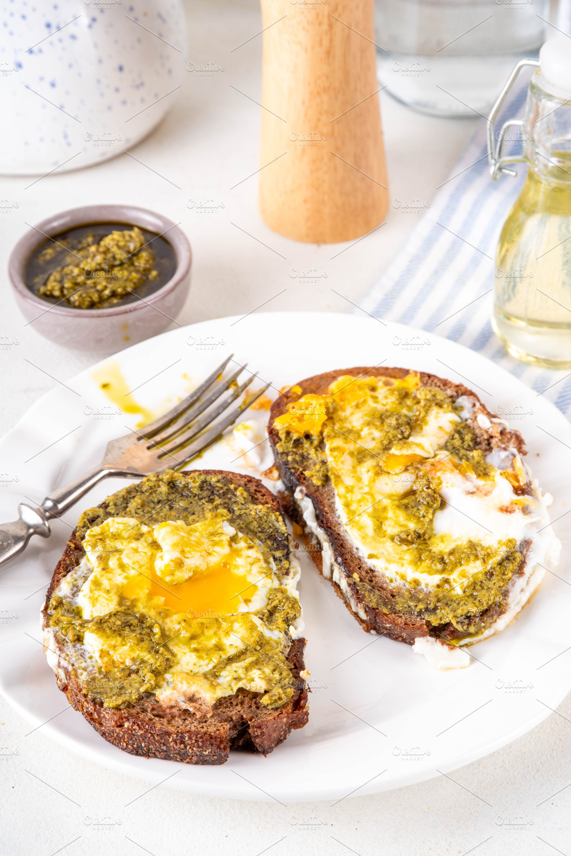 Viral Pesto Egg-In-A-Hole sandwich toasts for breakfast, a Food & Drink Photo by Rimma
