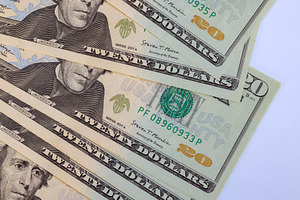 Pile of twenty dollar banknotes in, a Business Photo by Ungvar Studio