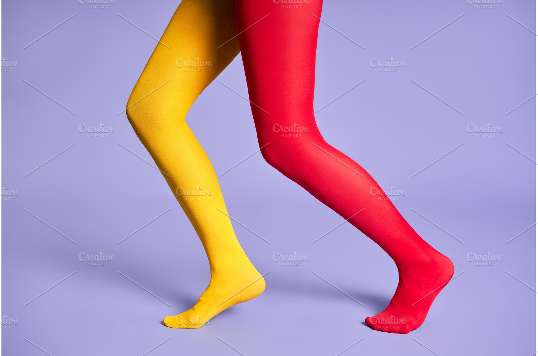 Long slim woman legs in multicolor, a Beauty & Fashion Photo by Gladkov photography